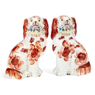 Lot 71 - A PAIR OF VICTORIAN STAFFORDSHIRE POTTERY MODELS OF FLOWER BASKET SPANIELS