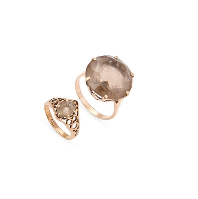 Lot 632 - A 9 CARAT GOLD SMOKY QUARTZ RING AND ANOTHER SMOKY QUARTZ DRESS RING