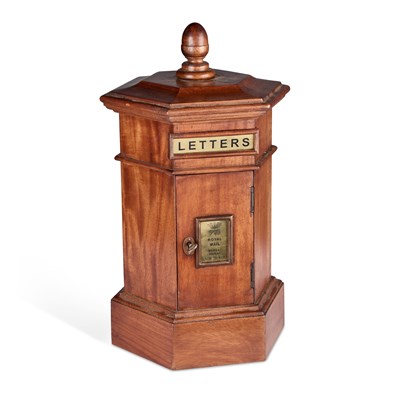 Lot 1078 - A CARVED MAHOGANY HEXAGONAL PILLAR LETTER BOX