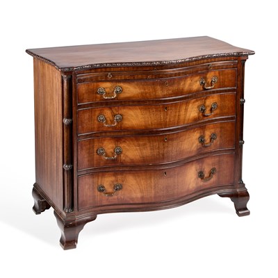 Lot 1016 - A GEORGE III STYLE MAHOGANY SERPENTINE CHEST OF DRAWERS