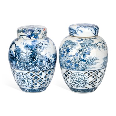 Lot 602 - A PAIR OF JAPANESE RETICULATED PORCELAIN GINGER JARS AND COVERS