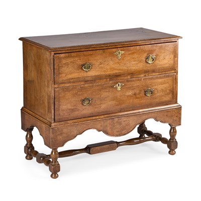 Lot 1049 - A CONTINENTAL WALNUT CHEST OF DRAWERS