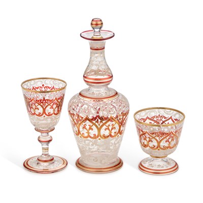 Lot 50 - A BOHEMIAN GILT AND ENAMELLED GLASS DECANTER AND TWO GLASSES