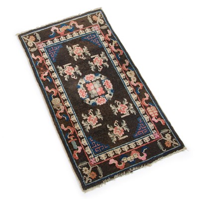 Lot 938 - A CHINESE BAOTOU RUG