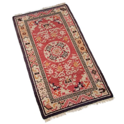 Lot 920 - A CHINESE BAOTOU RUG