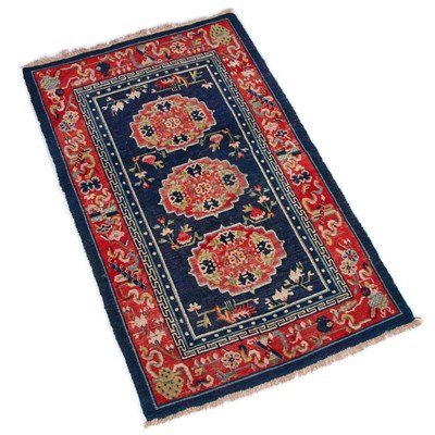 Lot 928 - A TIBETAN CHINESE RUG