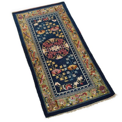 Lot 937 - A TIBETAN CHINESE RUG