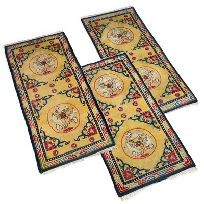 Lot 382 - A SET OF THREE CHINESE BAOTOU RUGS