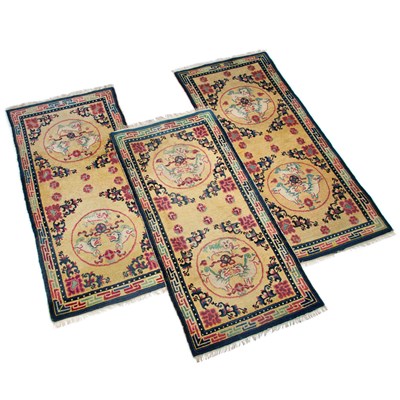 Lot 936 - A SET OF THREE CHINESE BAOTOU RUGS
