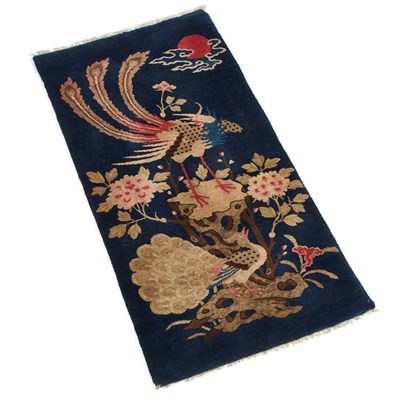 Lot 932 - A CHINESE BAOTOU RUG