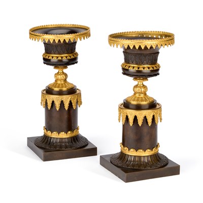 Lot 857 - A GOOD PAIR OF 19TH CENTURY FRENCH PARCEL-GILT AND PATINATED BRONZE URNS