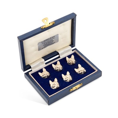 Lot 320 - A SET OF SIX ELIZABETH II SILVER MENU HOLDERS