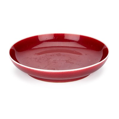 Lot 275 - A CHINESE LANGYAO-TYPE RED GLAZED DISH