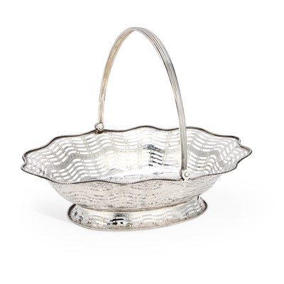 Lot 506 - A GEORGE III SILVER CAKE BASKET