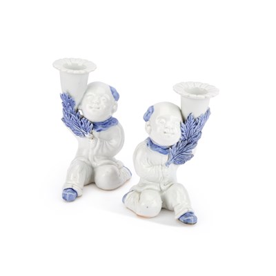 Lot 170 - A PAIR OF JAPANESE HIRADO PORCELAIN FIGURAL CANDLESTICKS