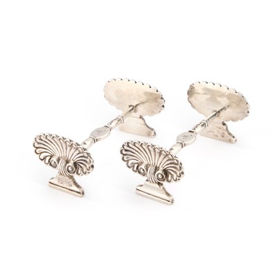 Lot 477 - AN UNUSUAL PAIR OF GEORGE IV SILVER KNIFE RESTS