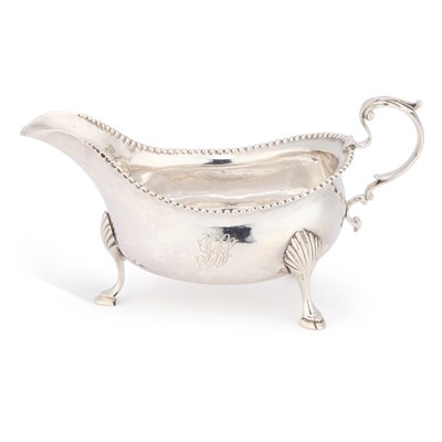 Lot 509 - A GEORGE III SILVER SAUCEBOAT