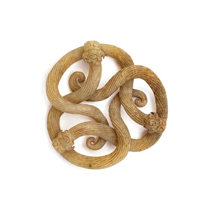 Lot 252 - A 19TH CENTURY CHINESE CELADON JADE CARVING OF COILED CHILONG DRAGONS
