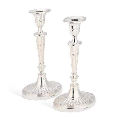 Lot 374 - A PAIR OF GEORGE III STYLE SILVER CANDLESTICKS