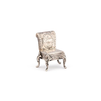 Lot 270 - A CONTINENTAL SILVER MINIATURE CHAIR