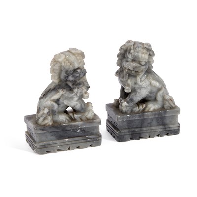Lot 655 - A PAIR OF CHINESE CARVED SOAPSTONE FOO LIONS