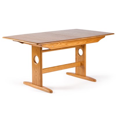 Lot 1029 - AN ERCOL WINDSOR ELM EXTENDING DINING TABLE