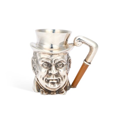 Lot 278 - A CAST SILVER CHARACTER JUG