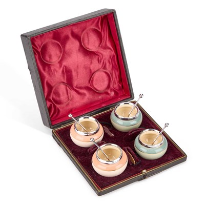 Lot 443 - A SET OF FOUR VICTORIAN SILVER-MOUNTED POTTERY SALTS