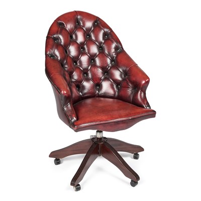 Lot 945 - A LEATHER UPHOLSTERED SWIVELLING DESK CHAIR