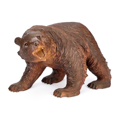 Lot 860 - A CARVED WOOD FIGURE OF A BEAR