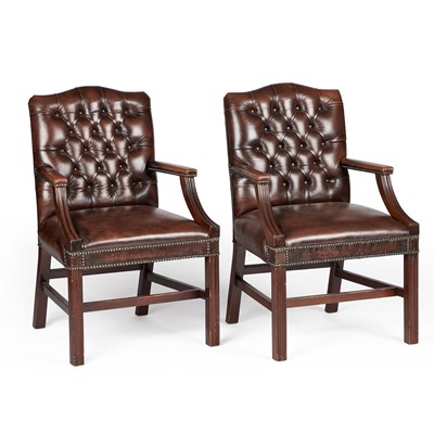 Lot 1156 - A PAIR OF BROWN LEATHER UPHOLSTERED ARMCHAIRS