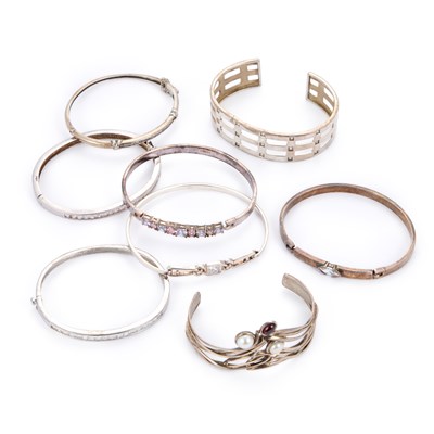Lot 720 - A GROUP OF GEM-SET BANGLES