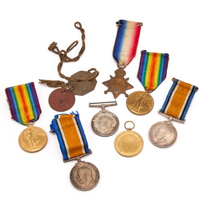 Lot 23 - A FIRST WORLD MEDAL TRIO AND TWO FIRST WORLD WAR MEDAL PAIRS