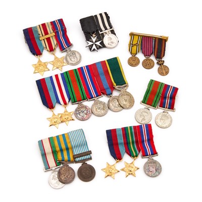 Lot 21 - A GROUP OF MOUNTED MINIATURE MEDAL GROUPS
