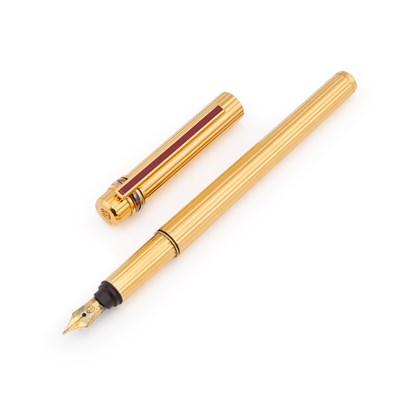 Lot 816 - A MUST DE CARTIER GOLD PLATED TRINITY FOUNTAIN PEN