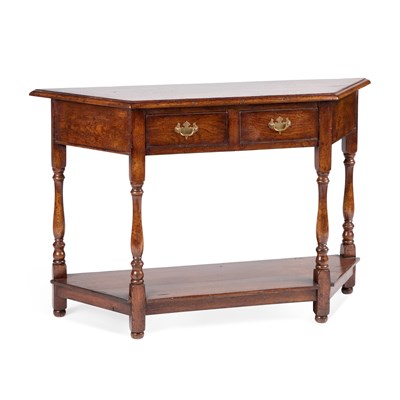 Lot 993 - A PERIOD STYLE OAK CANTED HALL TABLE