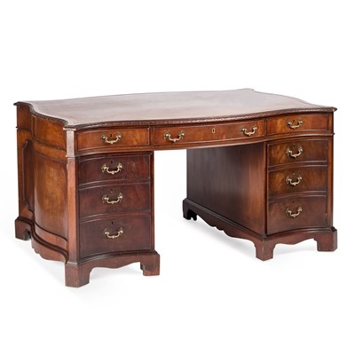 Lot 957 - A GEORGE III STYLE LEATHER-INSET MAHOGANY SERPENTINE PARTNER'S DESK