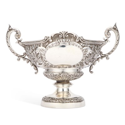 Lot 395 - A LARGE EDWARDIAN NAVAL-THEMED SILVER TWO-HANDLED TROPHY CUP