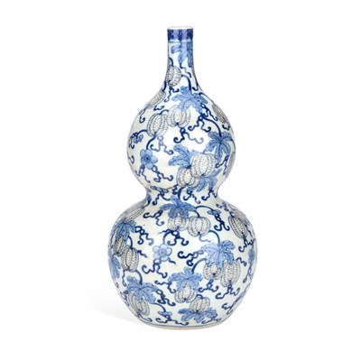 Lot 140 - A CHINESE BLUE AND WHITE PORCELAIN DOUBLE-GOURD VASE