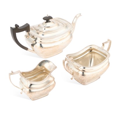Lot 370 - AN EARLY 20TH CENTURY SILVER THREE-PIECE TEA SERVICE