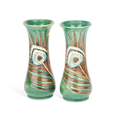 Lot 136 - A PAIR OF MOORCROFT PEACOCK FEATHERS PATTERN VASES