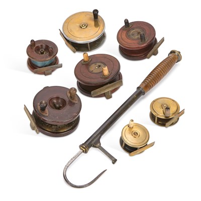 Lot 4 - A COLLECTION OF BRASS AND WOODEN REELS