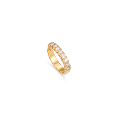 Lot 854 - AN 18 CARAT GOLD DIAMOND HALF HOOP RING