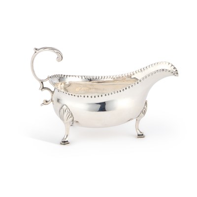 Lot 490 - A GEORGE III SILVER SAUCEBOAT