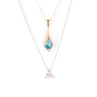 Lot 804 - TWO 9 CARAT GOLD PENDANTS ON CHAINS