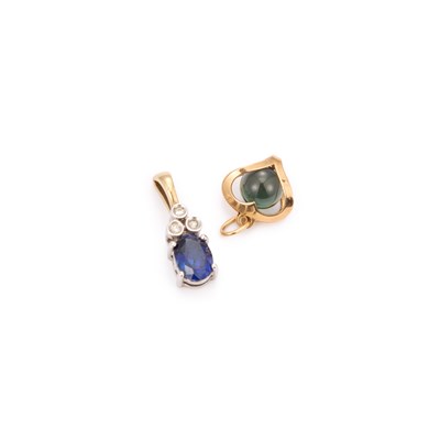 Lot 792 - A 9 CARAT GOLD SYNTHETIC SAPPHIRE AND DIAMOND PENDANT AND ANOTHER PENDANT