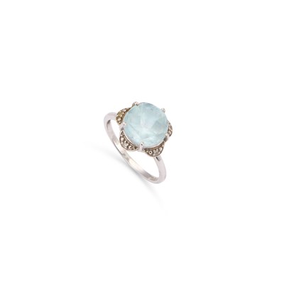 Lot 775 - A 9 CARAT WHITE GOLD BLUE TOPAZ AND DIAMOND RING