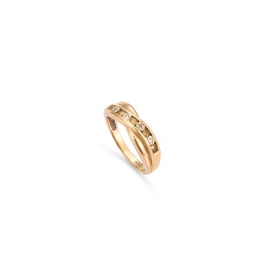 Lot 831 - A 9 CARAT GOLD YELLOW SAPPHIRE AND DIAMOND HALF HOOP CROSSOVER RING