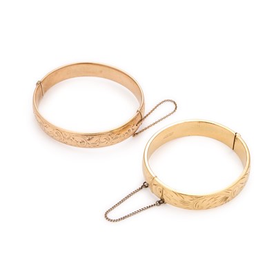Lot 766 - TWO ROLLED GOLD BANGLES