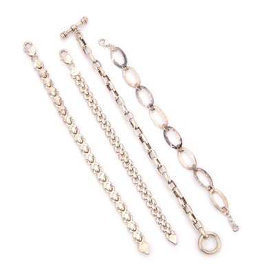 Lot 754 - FOUR SILVER BRACELETS
